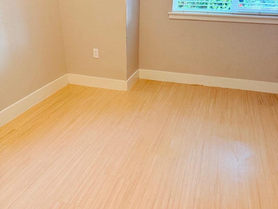 Empty kitchen after move-out cleaning, open cabinets (900×700)