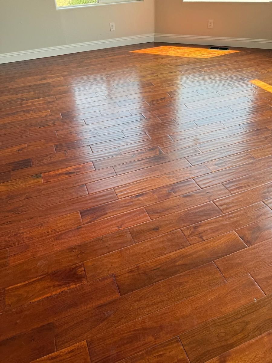 Freshly cleaned hardwood floors in a new build after post-construction cleaning